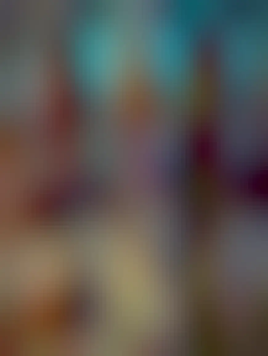 A cup of tea and timbits next to a forest of Christmas decorations