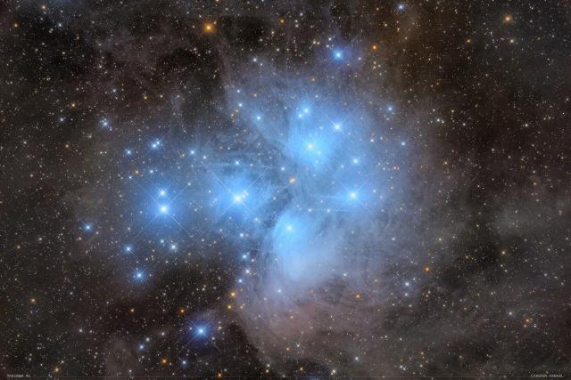 The Pleiades, M45.

Carsten Frenzl from Deutschland, CC BY 2.0, via Wikimedia Commons or Flickr: https://flic.kr/p/2oeBmbN