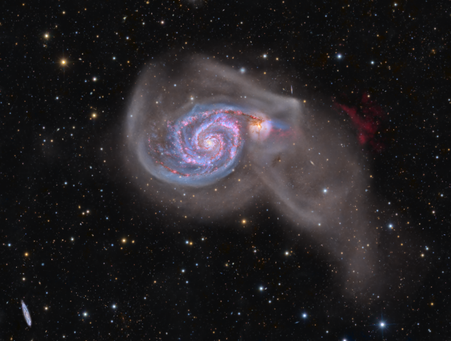 "Whirlpool Galaxy with Ionized Hydrogen Shelf."

William Ostling, CC BY 2.0, via Wikimedia Commons.