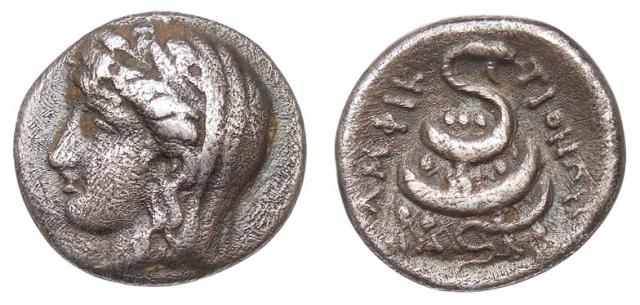 Delphi: Amphiktyonen. Demeter. Omphalos and snake.

Münzkabinett Berlin, Public domain, via Wikimedia Commons.