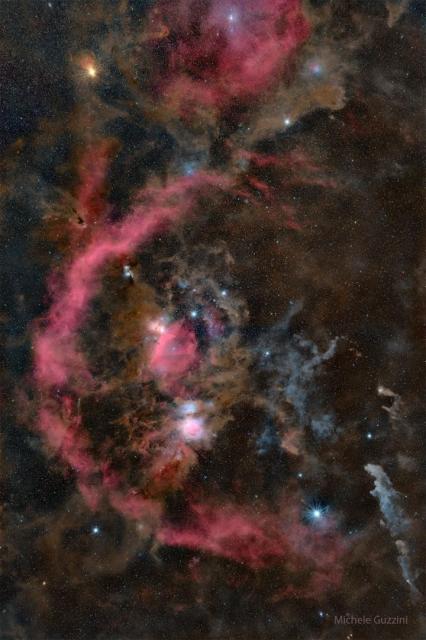 The constellation of Orion is shown, but the image is so deep that many nebula appear, making the belt stars and surrounding star almost recognizable. The rollover image labels the brightest stars.