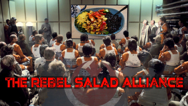 "The Rebel Salad Alliance" -Meme
A still from Star Wars showing the Rebel pilots briefing room scene. The room is full packed with the back of rebel pilots heads as they look ahead to a mission screen on the far wall center frame. The screen is edited to show a bowl of salad not the deathstar.