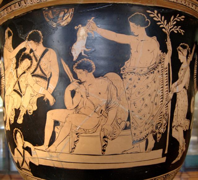 "Orestes being purified by Apollo" with Omphalos by Eumenides Painter.

Louvre Museum, Public domain, via Wikimedia Commons.