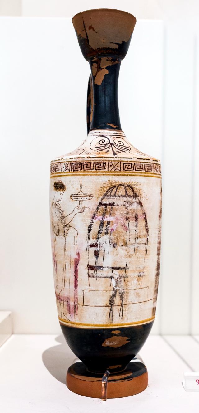 "Bird Painter - ARV 1688 8 - woman and youth at ovoid tomb - Athens NAM 19341."

ArchaiOptix, CC BY-SA 4.0, via Wikimedia Commons. Color and cropping edits.