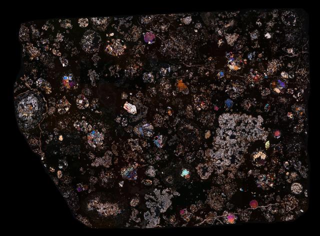 "Northwest Africa (NWA) 5239 Meteorite Thin Section."

Solar Anamnesis, CC BY-NC-ND 2.0 via Flickr: https://flic.kr/p/2kNUwXx