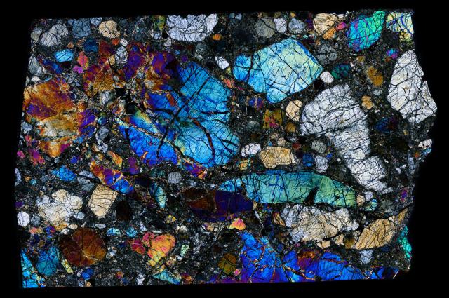 Thin Section of the Northwest Africa (NWA) 7835 Meteorite in Cross Polarized Light.

Solar Anamnesis, CC BY-NC-ND 2.0 via Flickr: https://flic.kr/p/X6Z3PN
