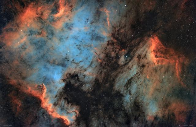 "NGC7000, IC5070 - North America and Pelican Nebula."

Carsten Frenzl from Deutschland, CC BY 2.0, via Wikimedia Commons or Flickr: https://flic.kr/p/2nC8RVb