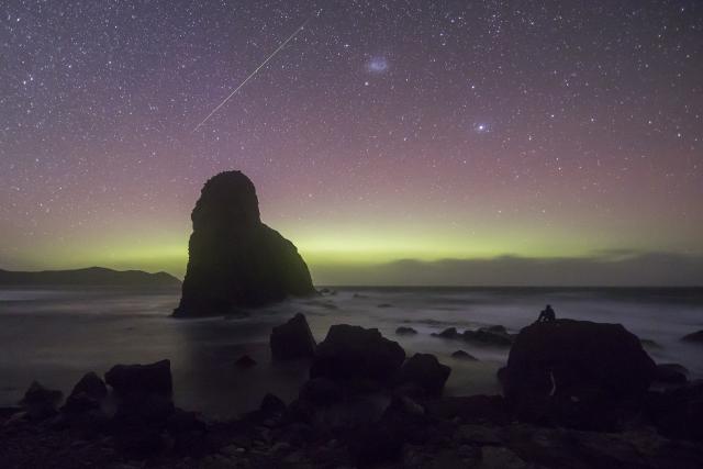 "Lion Rock, a shooting star and Aurora Australis."

Jamen Percy, CC BY-SA 4.0, via Wikimedia Commons.
