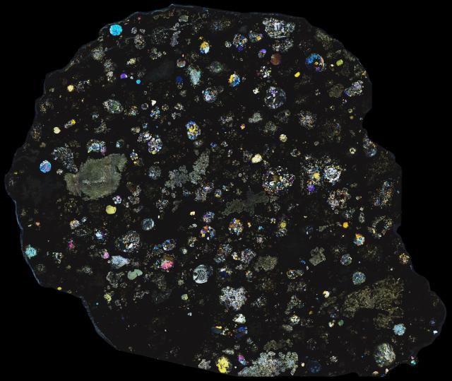 Thin Section of the Allende Meteorite in Cross Polarized Light.

Solar Anamnesis, CC BY-NC-ND 2.0 via Flickr: https://flic.kr/p/P2oaPq