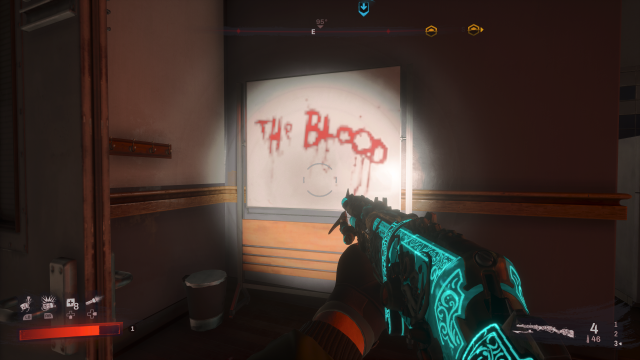 a whiteboard with extremely low resolution writing painted on it. it reads: "the blood"
