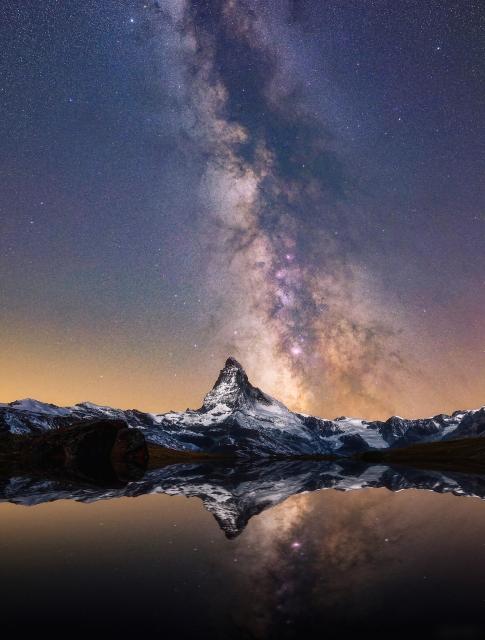 "Milkyway over Matterhorn."

Delil Geyik, CC BY-SA 4.0, via Wikimedia Commons.