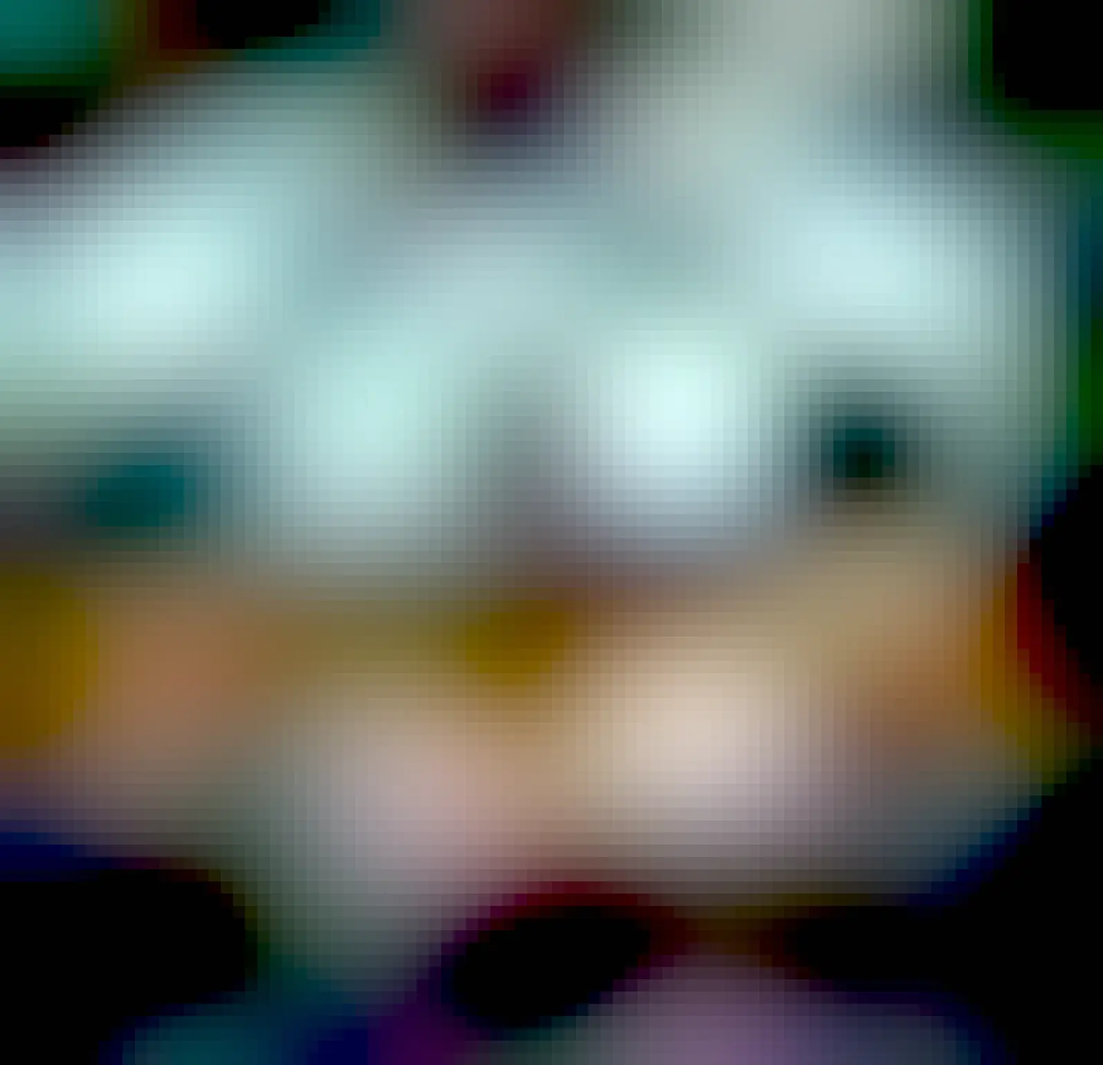 Photography of a very intricate window in a roof, circular with triangular sections through which blue sky is visible. The window frame is delicately engraved and has little pieces of mirror reflecting light.