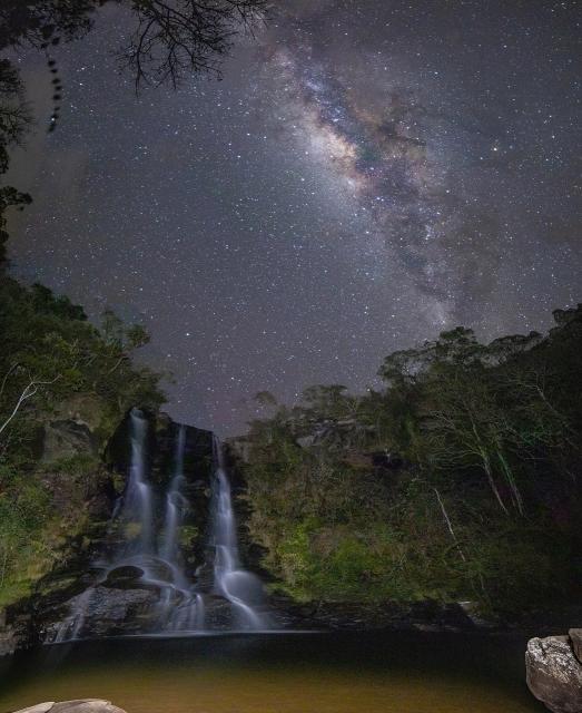 "Garcias Waterfall in Aiuruoca, starry night with the Milky Way in the sky."

Acauã Heuruel Cabral, CC BY-SA 4.0, via Wikimedia Commons.
