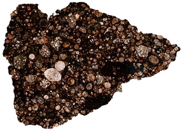 Thin Section of the Northwest Africa (NWA) 12692 Meteorite.

Solar Anamnesis, CC BY-NC-ND 2.0 via Flickr: https://flic.kr/p/2m7thdq