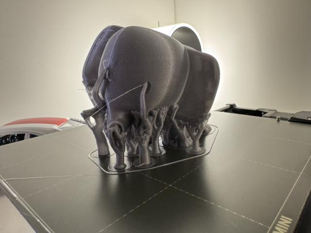3d print of ivory the elephant with organic supports connected to him. 