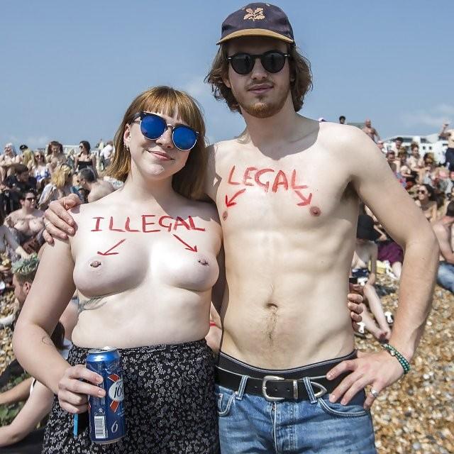 A photo of a topless woman and a topless man. The woman has "illegal" written above her breasts and arrows pointing to her nipples. The man has "legal" written above his nipples in the same way.