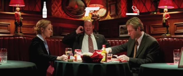 The Merchants of Death: (from left to right) alcohol lobbyist Polly Bailey, firearm lobbyist Bobby Jay Bliss and tobacco apologist Nick Naylor sitting at a restaurant table (from Thank You For Smoking film)