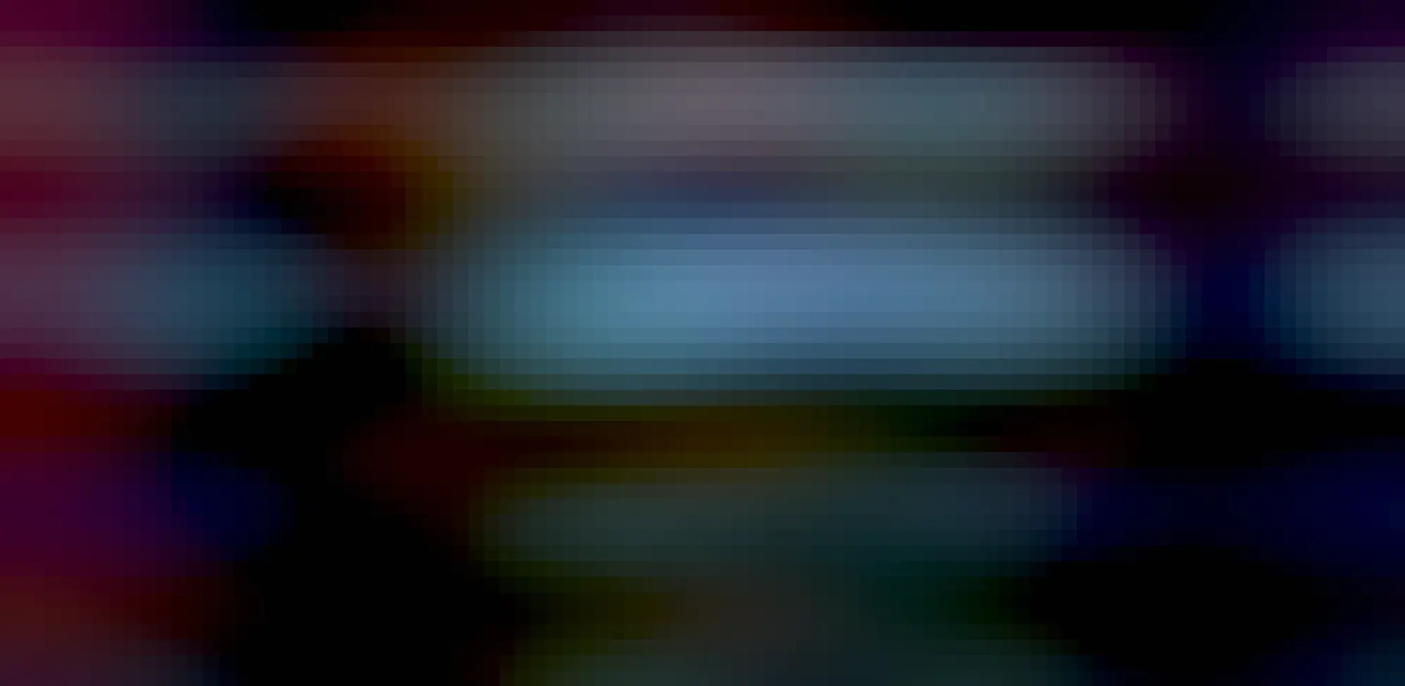 Photo of a touchscreen attached to a black box showing a music media player interface with images of album covers