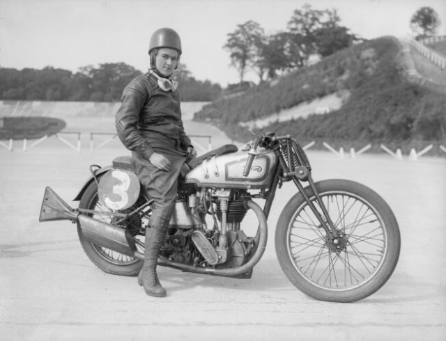 Beatrice Shilling and her motorcycle at the Brooklands race track in 1935. Credit: Unknown