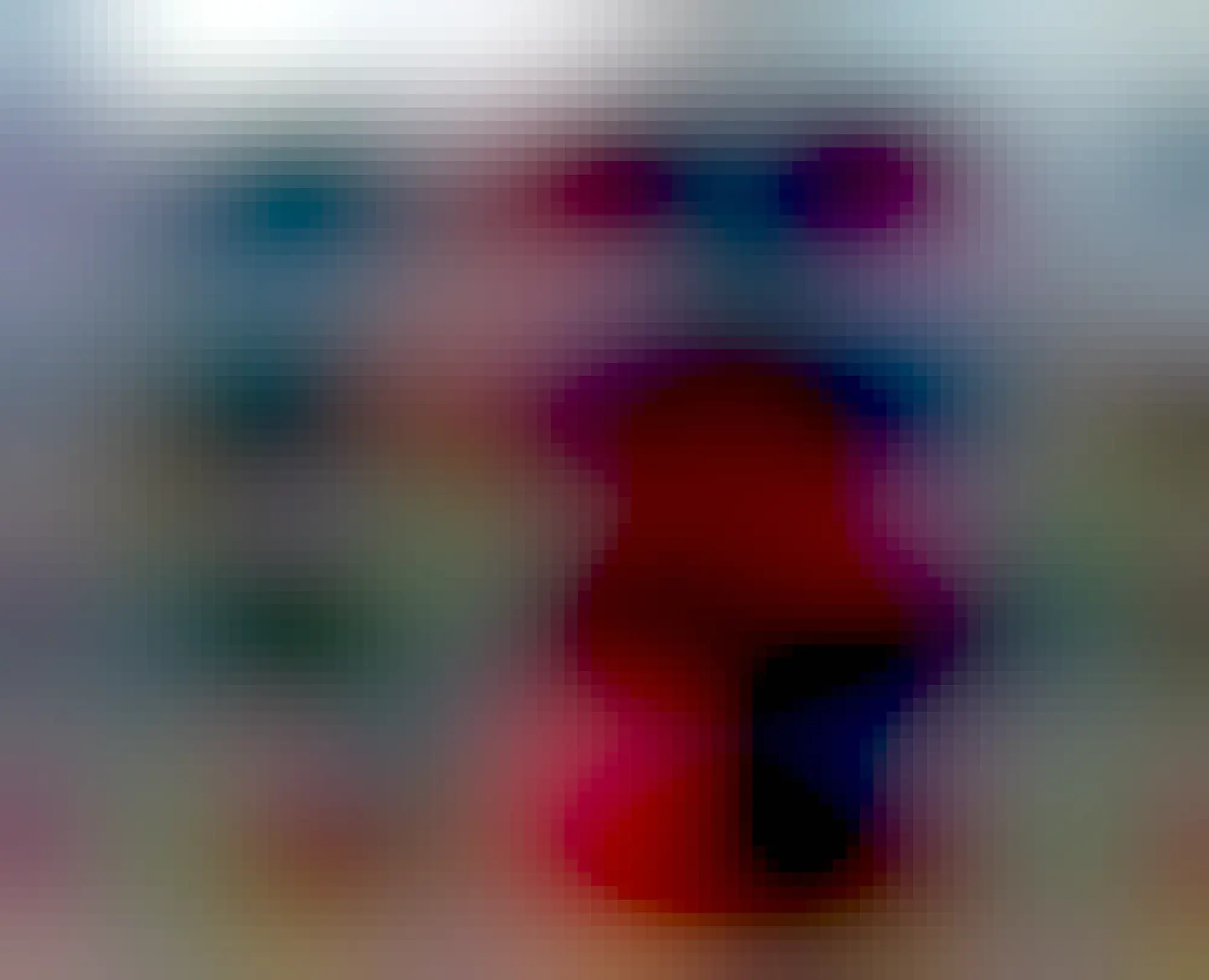 The same bookshelves from a different angle. They are linked together with a connecting section in between.