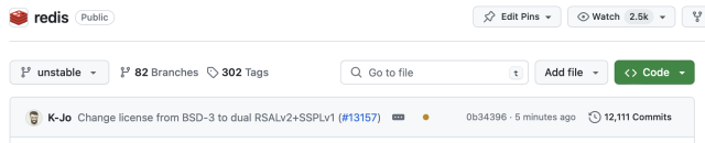 Screenshot from the Redis GitHub repo. The latest commit message says "Change license from BSD-3 to dual RSALv2+SSPLv1 (#13157)" 