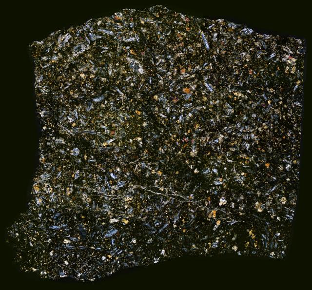 Thin Section of the Northwest Africa (NWA) 8159 Meteorite.

Solar Anamnesis, CC BY-NC-ND 2.0 via Flickr: https://flic.kr/p/TtcmyK