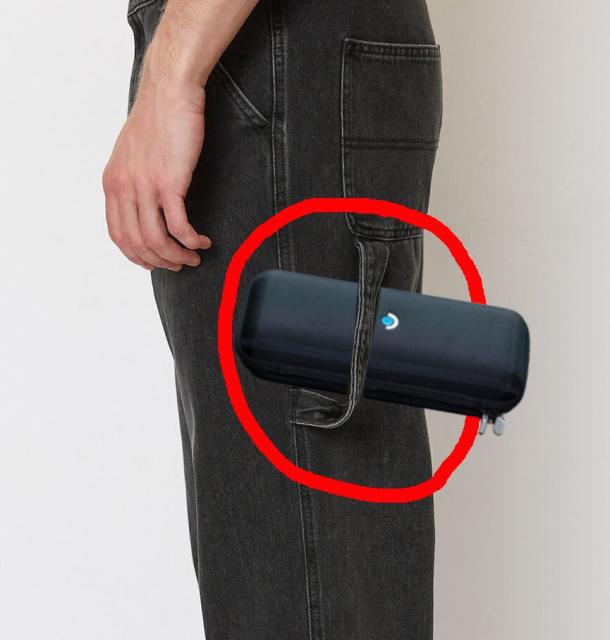 Steam Deck inside the case, inside the strap on jeans