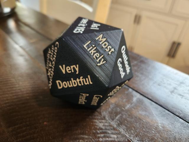 A 20 sided die with answers on each face, like a magic 8 ball