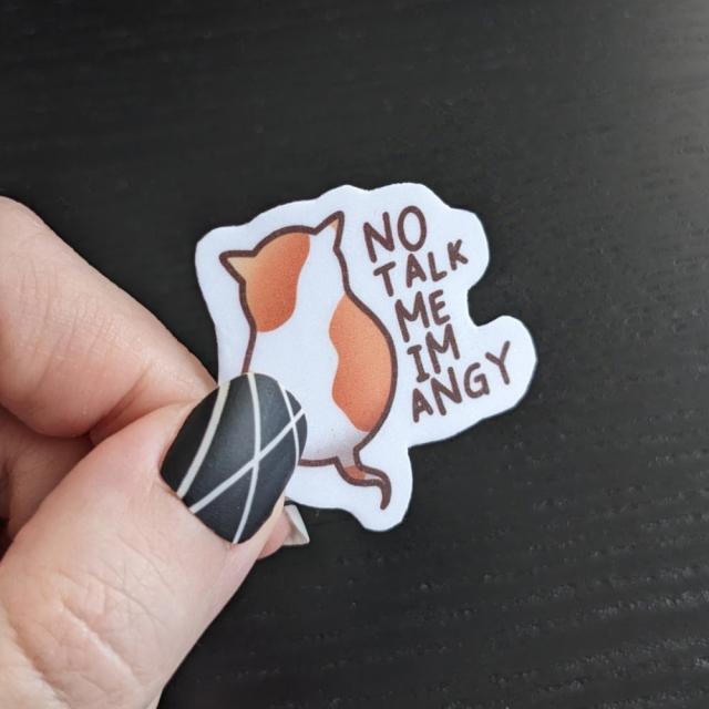 Illustration of a back of a white and orange cat with the text "no talk me, im angy"