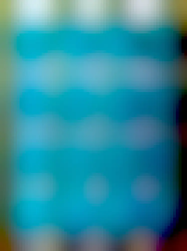 Blue book on a stripey background: livestreaming by el putnam