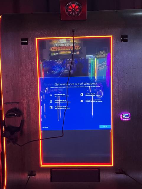VR arcade system at Dave and Busters showing only a Windows out of box experience wizard