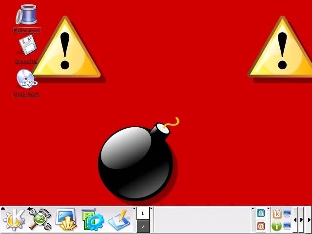 Screenshot of old SuSE Linux. It is logged in as root and the wallpaper is changed to red with warning signs and a bomb, implying that it’s dangerous to log in as root.