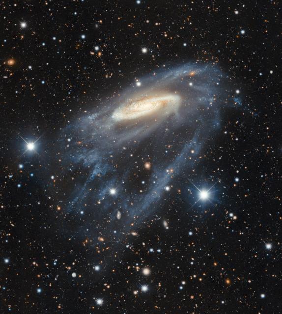 "The Unfurling Spiral Arms of NGC 3981."

Dark Energy Survey/DOE/FNAL/DECam/CTIO/NOIRLab/NSF/AURA Image processing: R. Colombari & M. Zamani (NSF's NOIRLab), CC BY 4.0, via Wikimedia Commons.