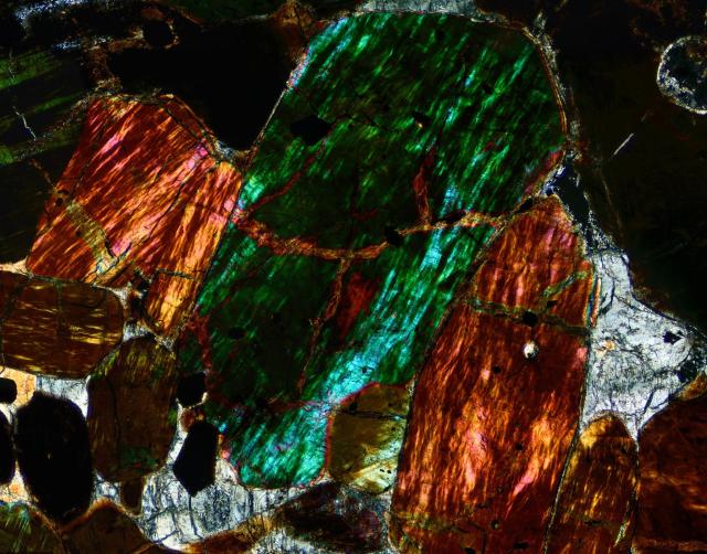 Northwest Africa (NWA) 2737 Meteorite Thin Section microphotograph.

Solar Anamnesis, CC BY-NC-SA 2.0 via Flickr: https://flic.kr/p/XZq4Jr