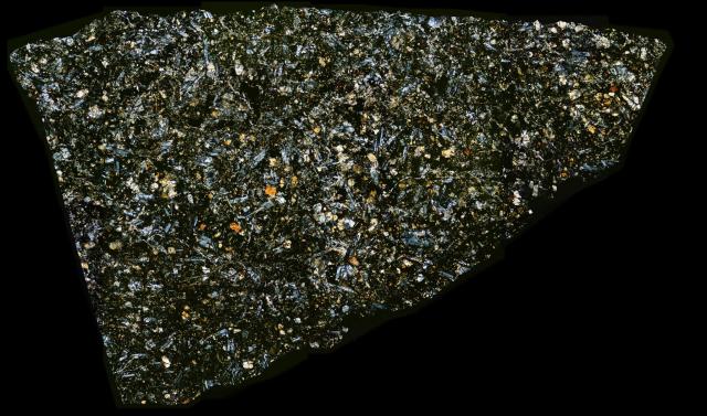 Thin Section of the Northwest Africa (NWA) 8159 Meteorite.

Solar Anamnesis, CC BY-NC-ND 2.0 via Flickr: https://flic.kr/p/UjwdCr