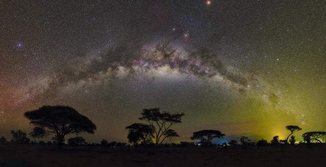 "Milky Way Arch over Amboseli National Park."

Amirreza Kamkar/IAU OAE, CC BY 4.0, via Wikimedia Commons.