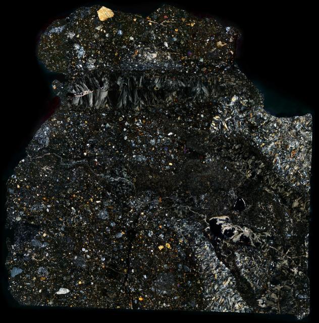 Thin Section of the Northwest Africa (NWA) 8010 Meteorite.

Solar Anamnesis, CC BY-NC-ND 2.0 via Flickr: https://flic.kr/p/Urc9BK