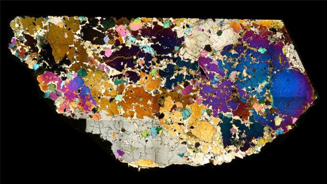 Thin Section of the Northwest Africa (NWA) 6704 Meteorite.

Solar Anamnesis, CC BY-NC-ND 2.0 via Flickr: https://flic.kr/p/DPWFQc