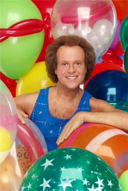 Richard Simmons surrounded by balloons