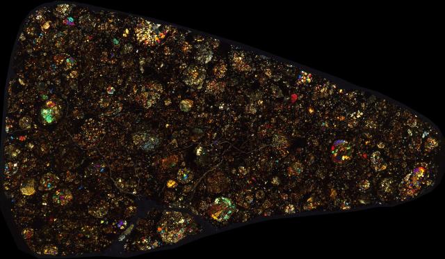 Northwest Africa (NWA) 801 Meteorite Thin Section - XPL HDR Pathscan Enabler.

Solar Anamnesis, CC BY-NC-SA 2.0 via Flickr: https://flic.kr/p/2hZ1SC2