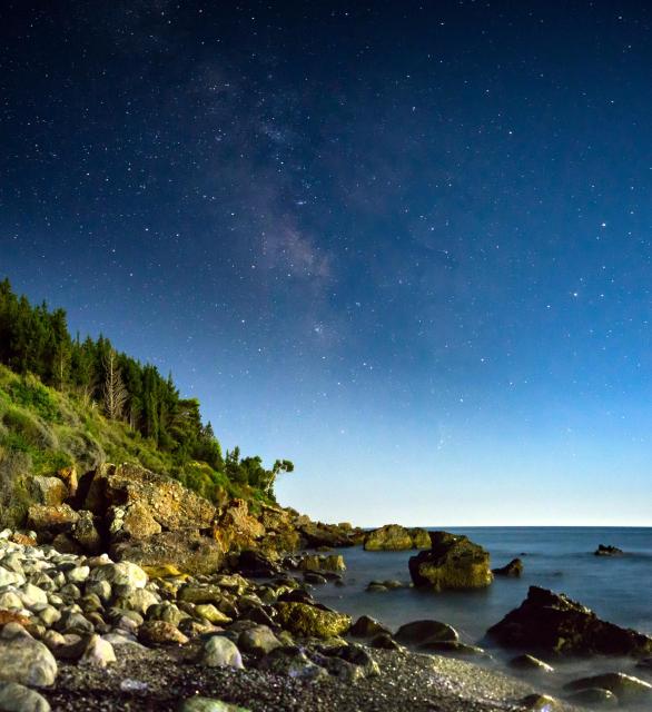 "The Milkyway above Lourdas Beach."

Tim Kullack, CC BY-SA 4.0, via Wikimedia Commons. Color edits.