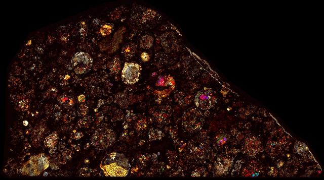 Northwest Africa (NWA) 12590 Meteorite Thin Section - XPL HDR Pathscan Enabler.

Solar Anamnesis, CC BY-NC-SA 2.0 via Flickr: https://flic.kr/p/2i2CF8p