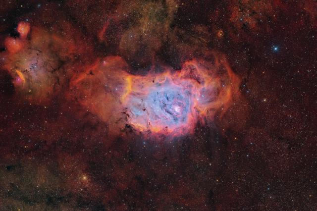 "Messier 8 - The lagoon nebula in SHO."

Carsten Frenzl from Deutschland, CC BY 2.0, via Flick: https://flic.kr/p/2pUmxBw