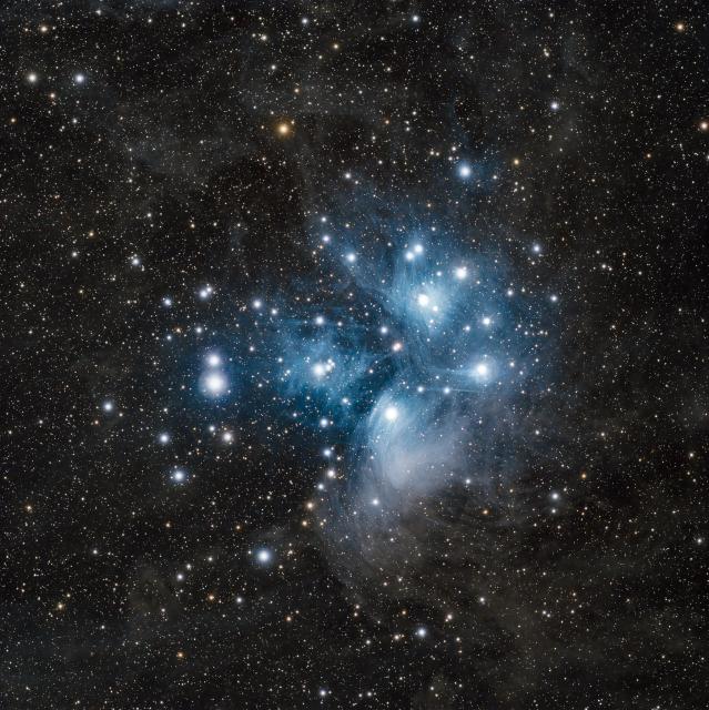 "M45, the Pleaides cluster."

Manolo Gómez, CC BY 2.0 via Flickr: https://flic.kr/p/2pwqGH7