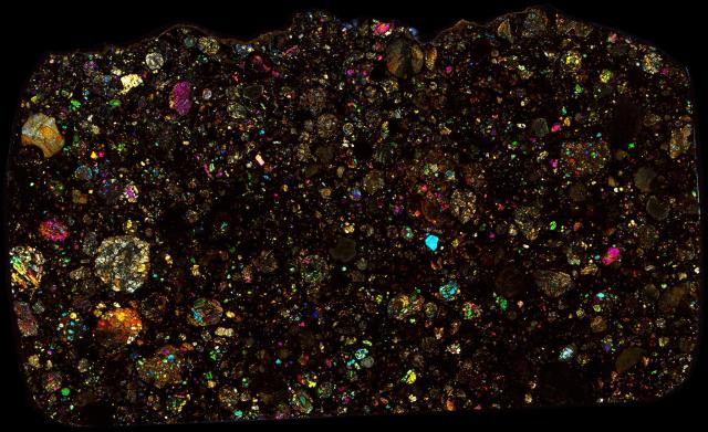 Northwest Africa (NWA) 4560 Meteorite Thin Section - XPL HDR Pathscan Enabler.

Solar Anamnesis, CC BY-NC-SA 2.0 via Flickr: https://flic.kr/p/2hWdGMj