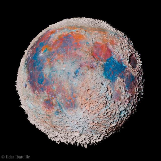 Earth's Moon is shown with the heights of surface features all greatly exaggerated. Also, the colors of the Moon have been exaggerated so areas of blue and red are more easily seen.