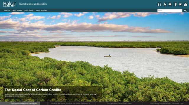 Home page of Hakai Magazine, dominated by a large photo of a man in a boat surrounded by mangroves in a Senegalese estuary. Photo by Nick Fox.