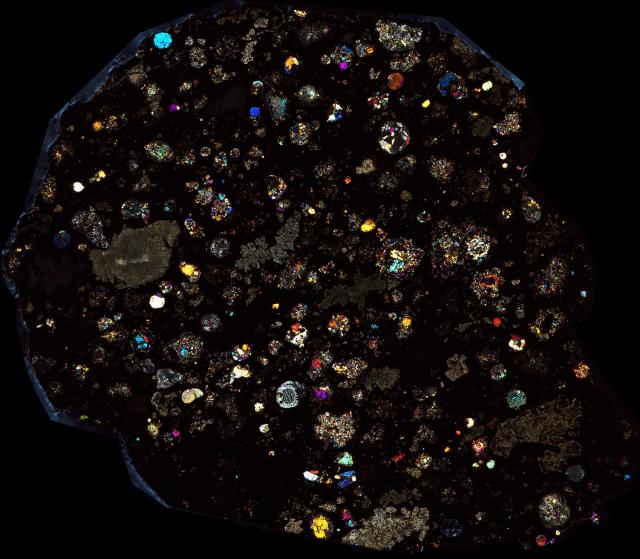 Allende Meteorite Thin Section - XPL HDR Pathscan Enabler.

Solar Anamnesis, CC BY-NC-SA 2.0 via Flickr: https://flic.kr/p/2hWgg1M