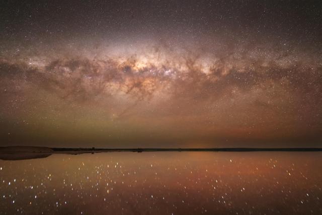 "Milky Way setting over Lake Tyrrell, Vic."

patrickkavanagh, CC BY 2.0, via Wikimedia Commons.
