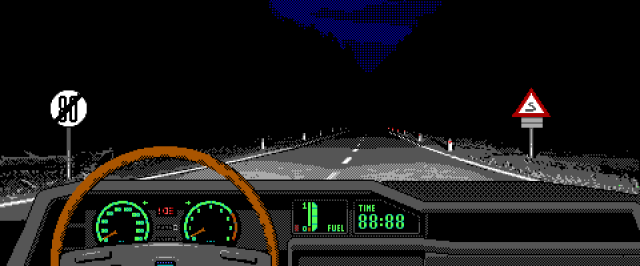 This is a pixelated image of a car driving at night with the limitations of the EGA palette. The image is from the inside of the car, looking out the windshield. The steering wheel is visible in the foreground along with the dashboard, which shows a speedometer, a fuel gauge, and a digital clock reading 88:88. The road is dark, with a white line in the center. There are a few streetlights on the side of the road, and a sign indicating a sharp curve ahead. The sky is dark with a faint blue glow, suggesting that it is nighttime. (Description was AI generated)